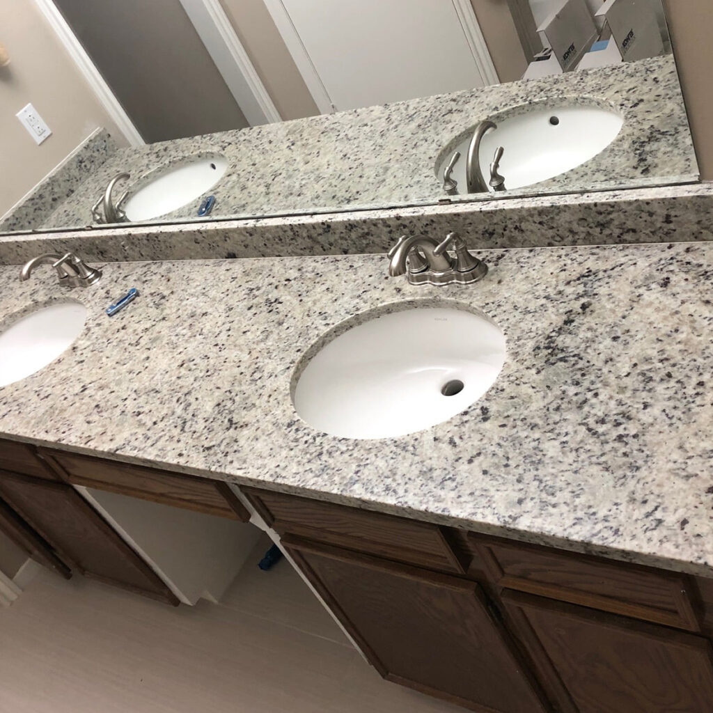 bathroom granite countertop and cabinets